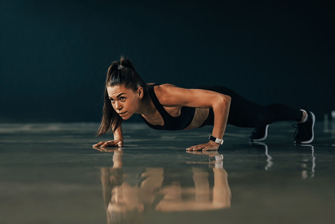 A woman doing a push-up